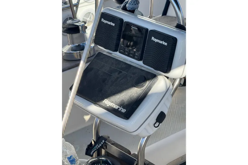Slide: The Image of Raymarine navigation equipment on 1991 Island Packet Yachts 38 sailboat cockpit. - 9