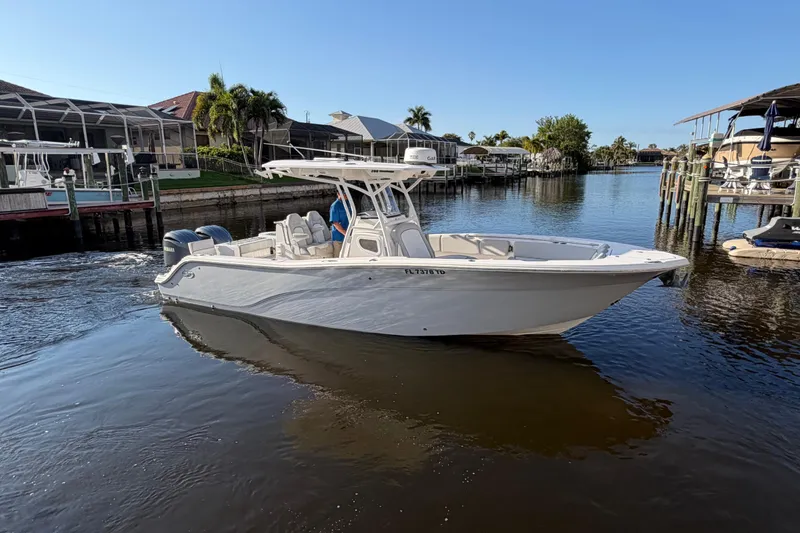 The Image of 2022 Sea Fox 288 Commander boat cruising in a scenic waterfront area. - 27