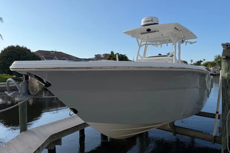 Slide: The Image of 2022 Sea Fox 288 Commander boat docked by waterfront. - 33