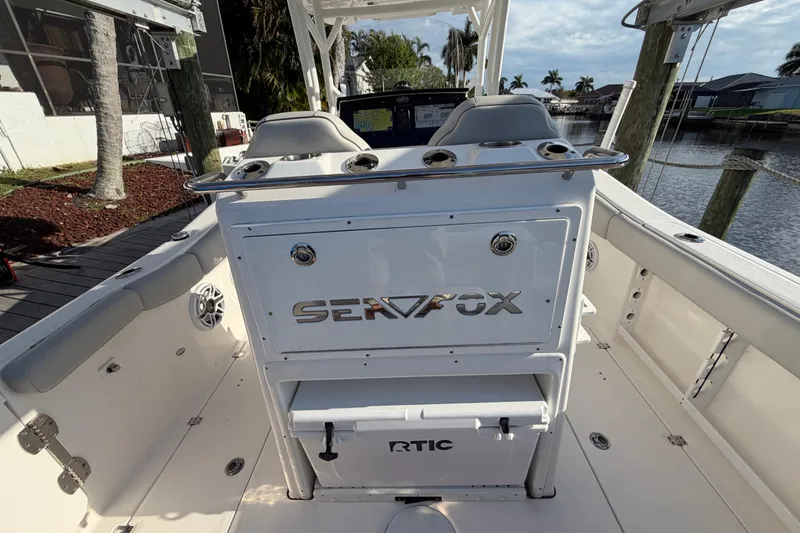Slide: The Image of 2022 Sea Fox 288 Commander boat interior with seating and storage compartments. - 56