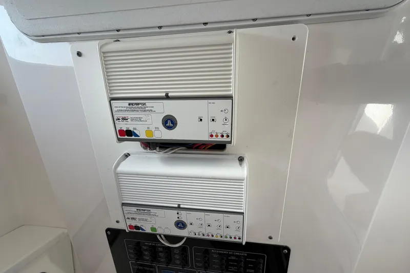 Slide: The Image of Control panel on a 2022 Sea Fox 288 Commander boat, featuring electronic systems. - 61