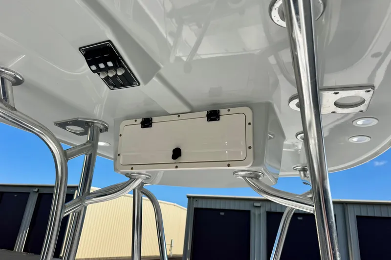 Slide: The Image of 2023 Contender 26 Bay boat console with stainless steel supports and control panel. - 18