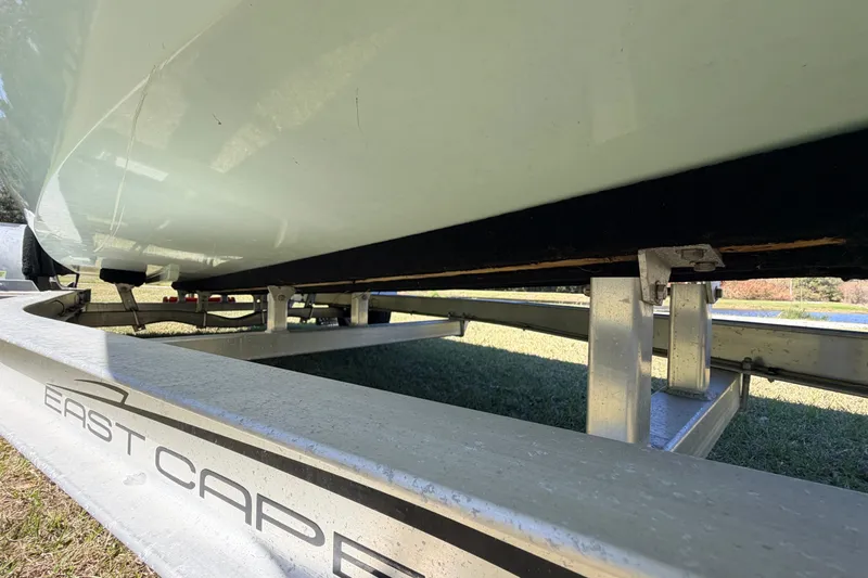 Slide: The Image of 2023 East Cape 18 EVO X boat on trailer, close-up view. - 14