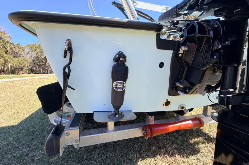 Slide: The Image of 2023 East Cape 18 EVO X boat transom with trim tabs and motor mount. - 21