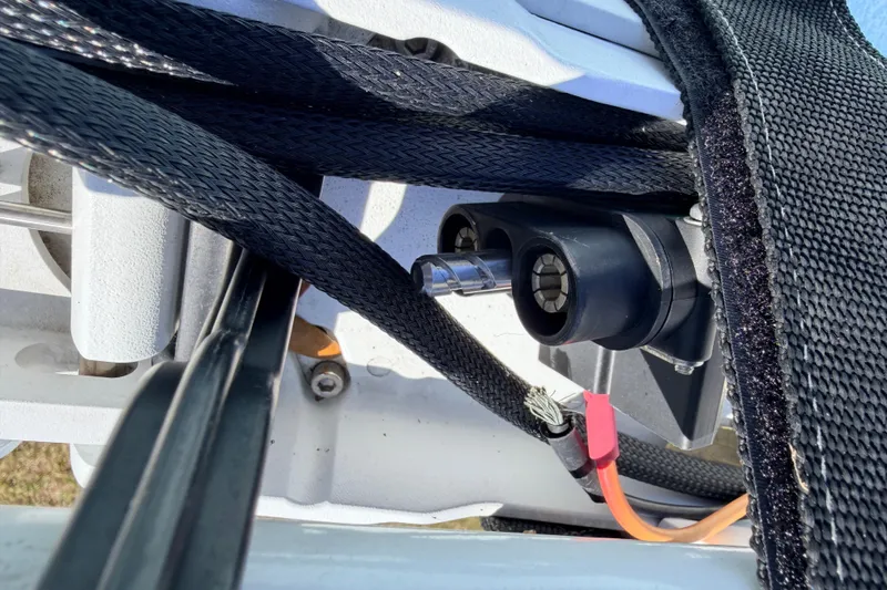 Slide: The Image of Close-up of 2023 East Cape 18 EVO X boat components with black straps and cables. - 35
