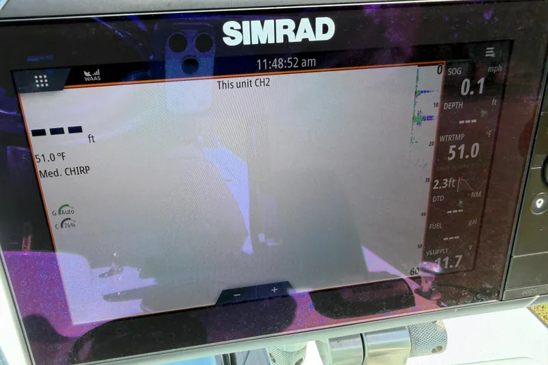 Slide: The Image of Simrad marine display showing navigation data on East Cape 18 EVO X, 2023 model. - 52