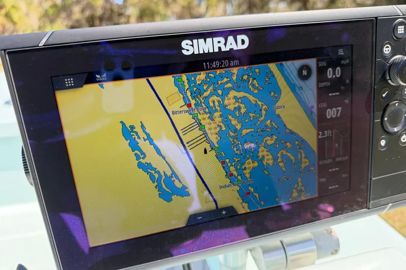 Slide: The Image of Simrad GPS display on 2023 East Cape 18 EVO X boat, showing navigational map. - 54