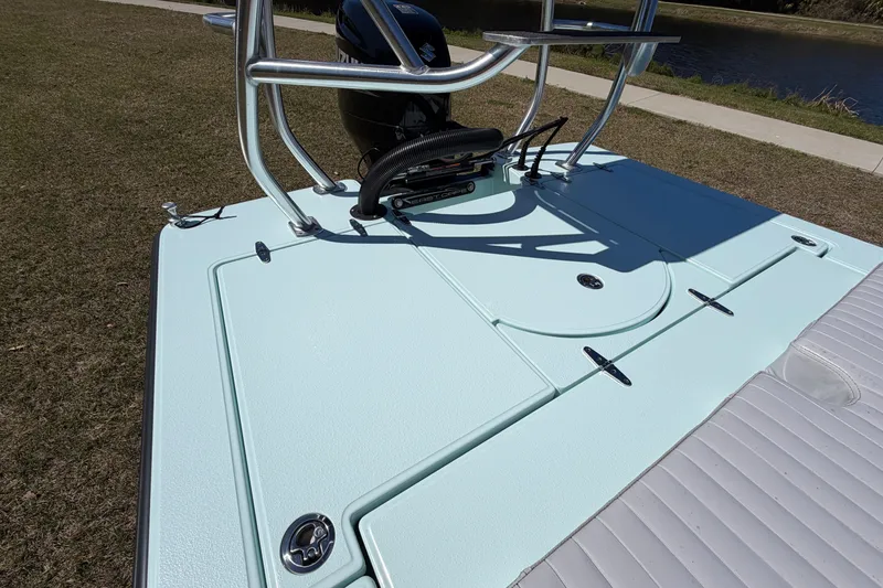 Slide: The Image of 2023 East Cape 18 EVO X boat deck with sleek design and modern features. - 57