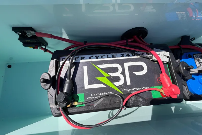 Slide: The Image of Lithium battery setup in 2023 East Cape 18 EVO X boat. - 62