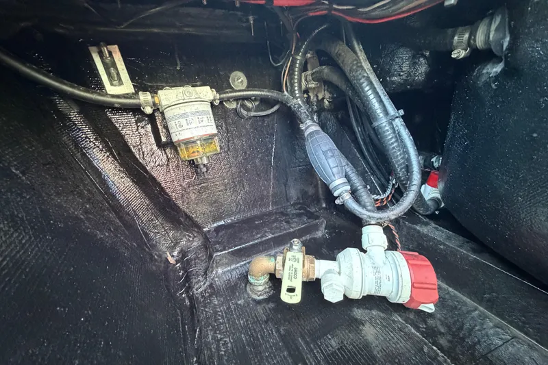 Slide: The Image of Interior view of 2023 East Cape 18 EVO X boat showing fuel system components. - 68