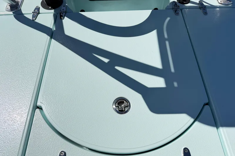 Slide: The Image of 2023 East Cape 18 EVO X boat deck with shadow and latch detail. - 69