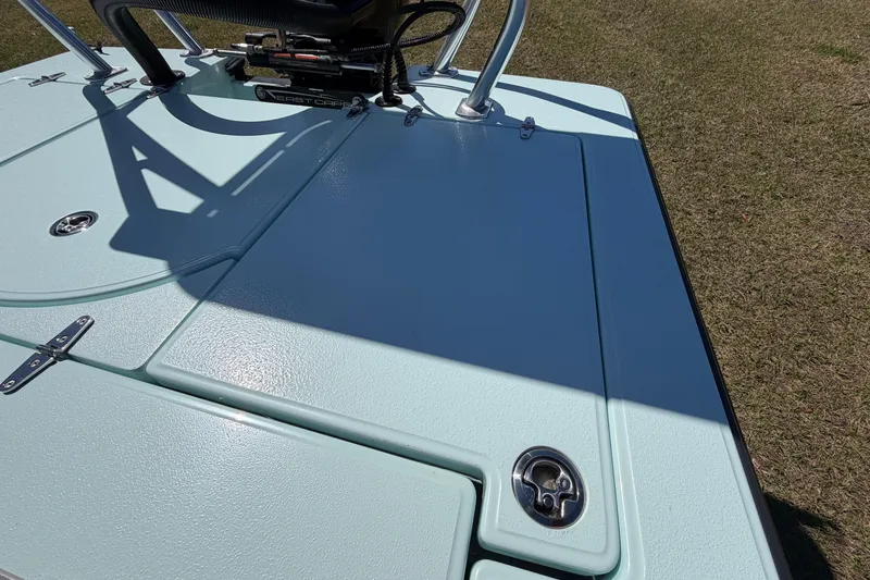 Slide: The Image of 2023 East Cape 18 EVO X boat deck with sleek design and hardware. - 72