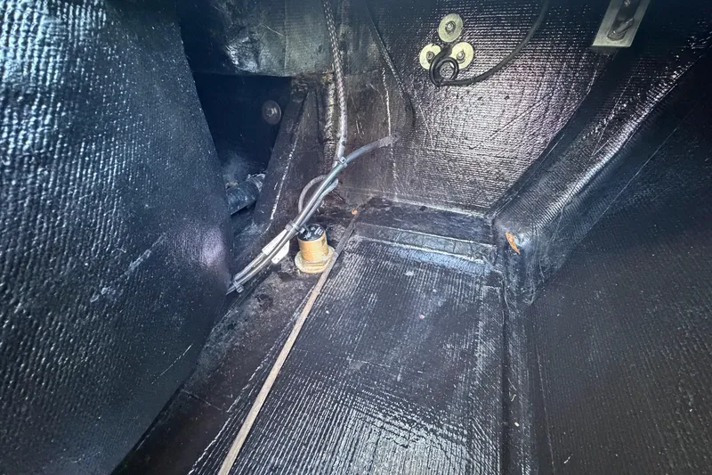 Slide: The Image of Interior view of 2023 East Cape 18 EVO X boat showing wiring and components. - 74