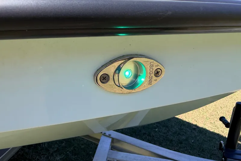 Slide: The Image of 2023 East Cape 18 EVO X boat with illuminated navigation light. - 84