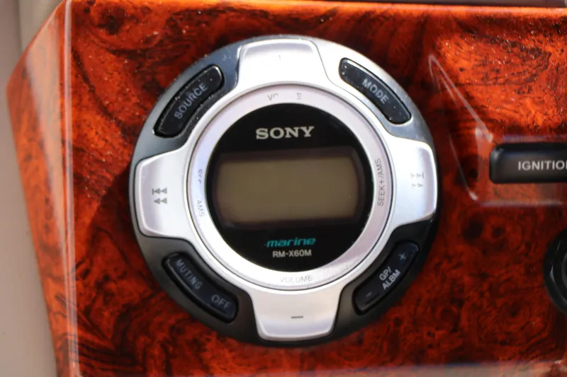 Slide: The Image of Sony marine stereo on 2014 Regency Party Barge 254 XP3 dashboard. - 38