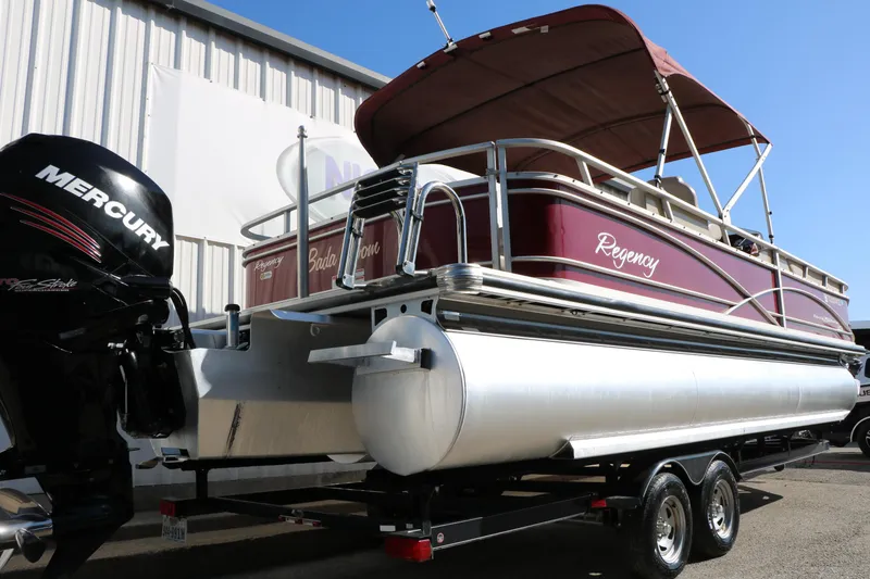 Slide: The Image of 2014 Regency Party Barge 254 XP3 pontoon boat with Mercury engine on trailer. - 4
