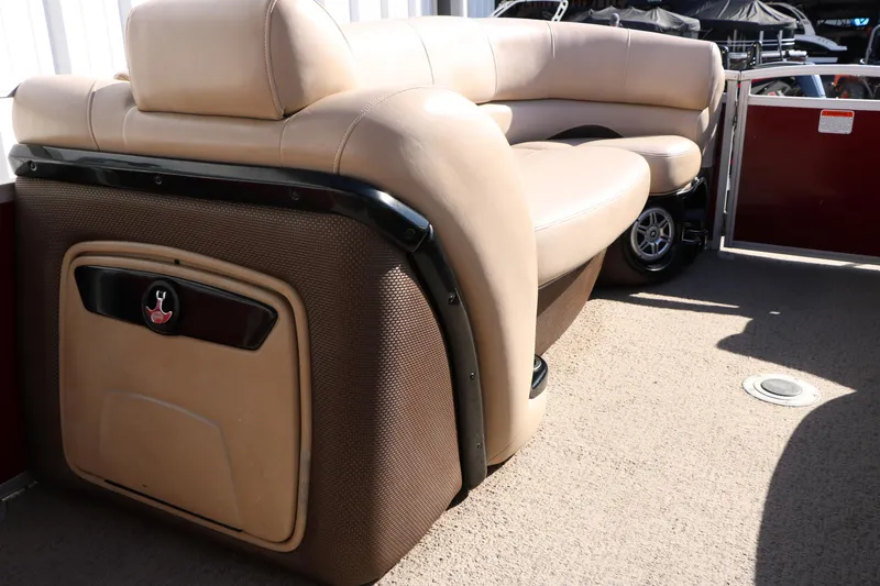 Slide: The Image of 2014 Regency Party Barge 254 XP3 interior with beige seating and storage compartment. - 42