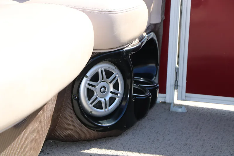 Slide: The Image of Speaker and cup holder on 2014 Regency Party Barge 254 XP3 boat. - 43