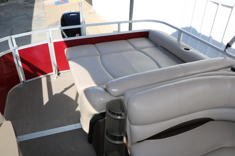 Slide: The Image of 2014 Regency Party Barge 254 XP3 interior with beige seating and red accents. - 44