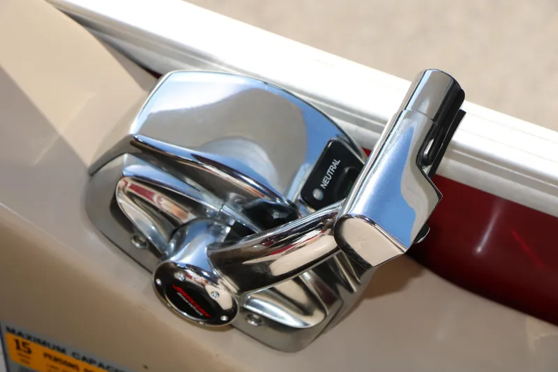 Slide: The Image of Chrome throttle control on 2014 Regency Party Barge 254 XP3 boat. - 51