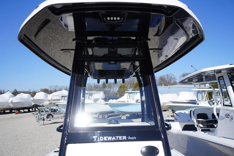 Slide: The Image of 2026 Tidewater 232 CC Adventure boat with sleek design and modern features. - 18
