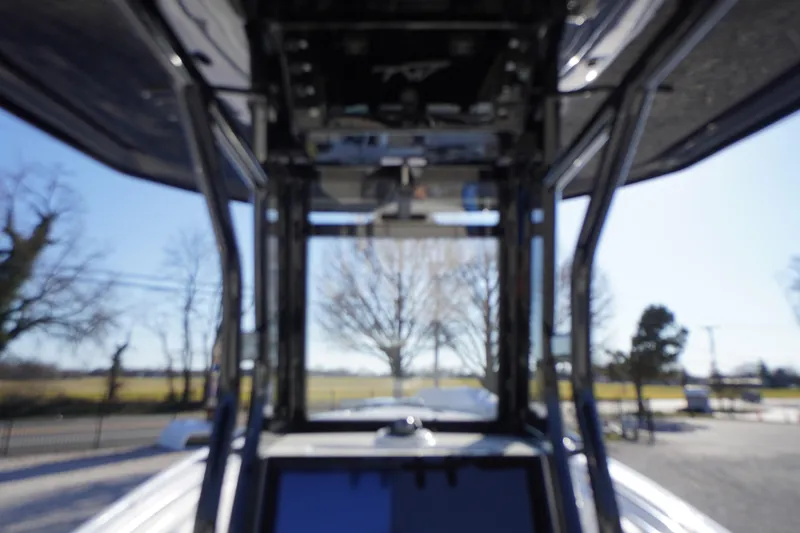 Slide: The Image of Blurry view from inside a 2026 Tidewater 232 CC Adventure boat. - 32