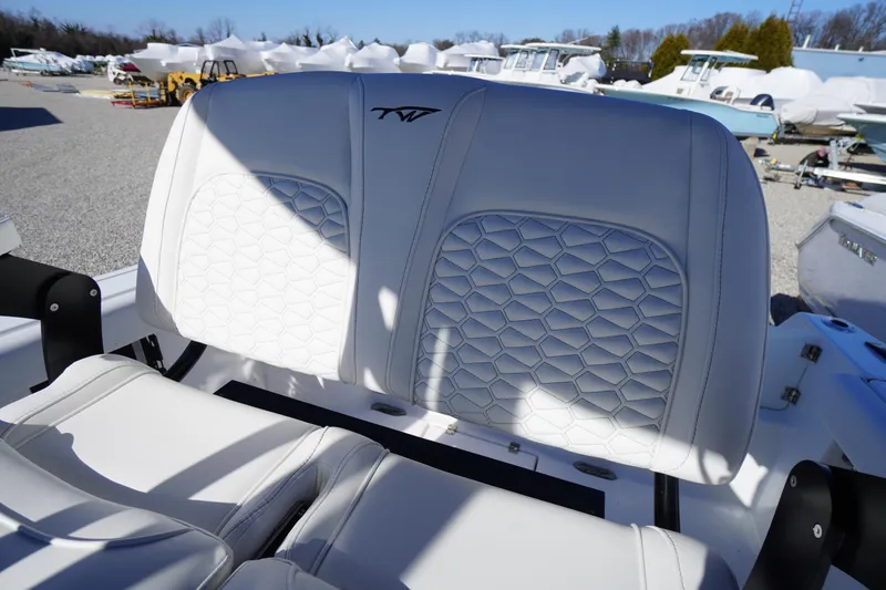 Slide: The Image of 2026 Tidewater 232 CC Adventure boat seat with hexagonal stitching detail. - 37