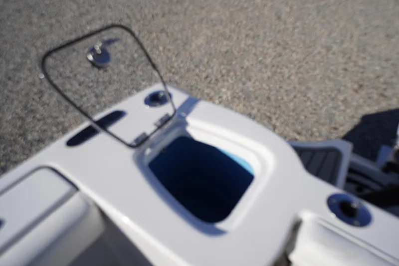 Slide: The Image of Open storage compartment on 2026 Tidewater 232 CC Adventure boat. - 52