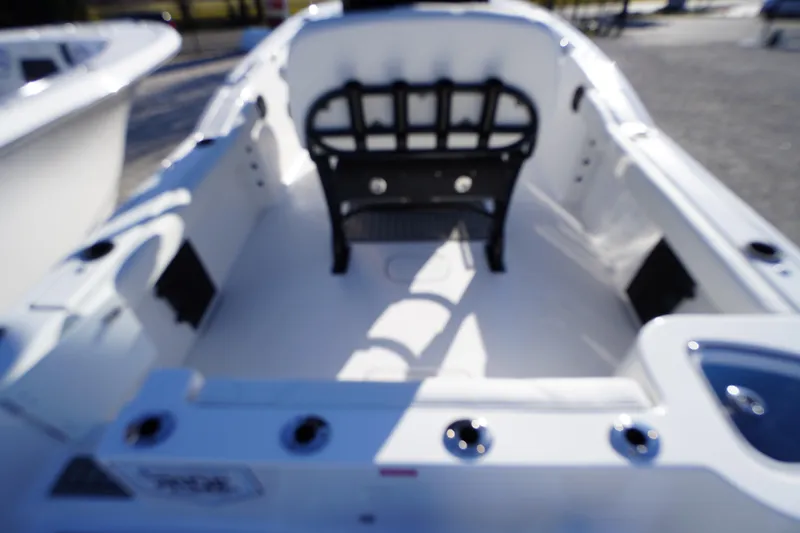 Slide: The Image of 2026 Tidewater 232 CC Adventure boat interior, featuring spacious seating and modern design. - 55