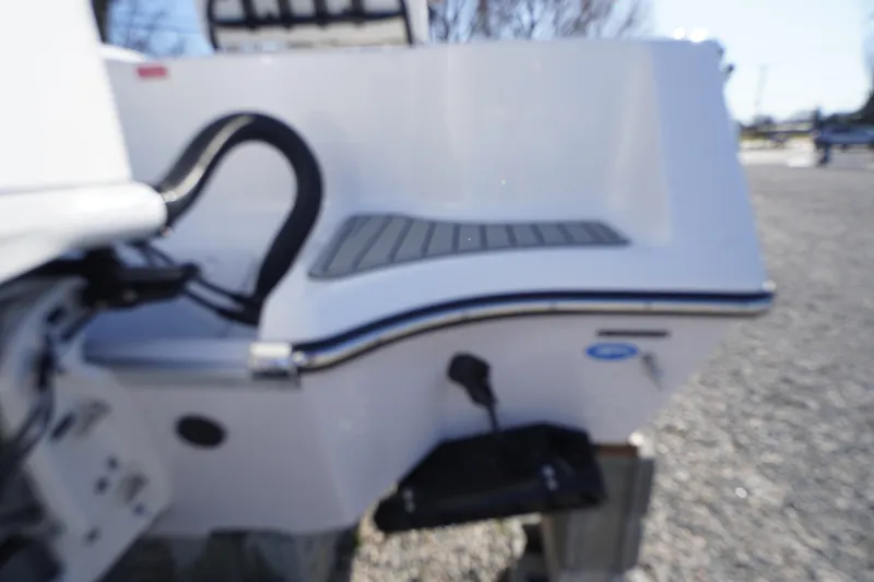 Slide: The Image of 2026 Tidewater 232 CC Adventure boat rear view, featuring sleek design and modern fittings. - 64