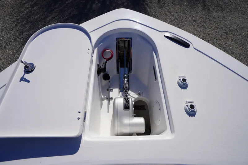 Slide: The Image of 2026 Tidewater 232 CC Adventure boat anchor compartment, featuring sleek design and modern fittings. - 7