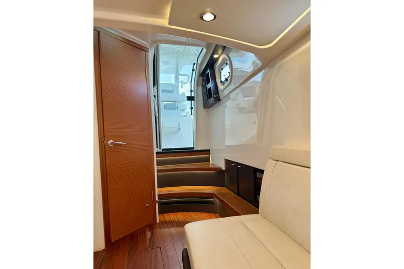 Slide: The Image of Interior of 2020 Pursuit S 408 Sport boat with wooden flooring and modern design. - 28