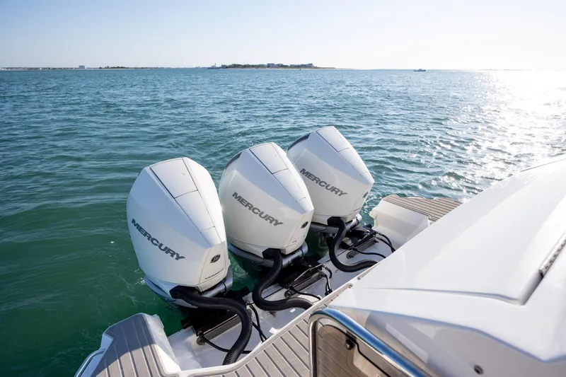 Slide: The Image of 2024 Sea Ray Sundancer 320 Outboard interior with control panel and ventilation. - 21