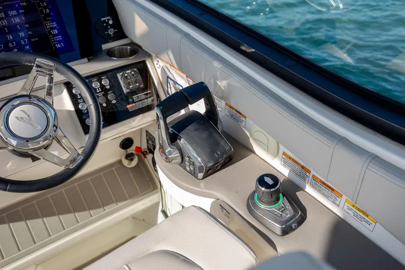 Slide: The Image of 2024 Sea Ray Sundancer 320 Outboard boat interior with luxurious seating and ocean view. - 31
