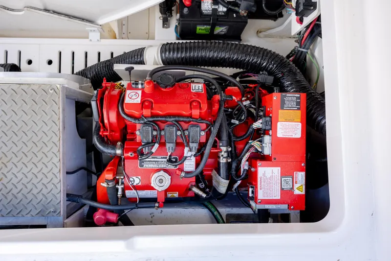 Slide: The Image of 2024 Sea Ray Sundancer 320 Outboard cabin interior with modern design and cozy seating. - 38