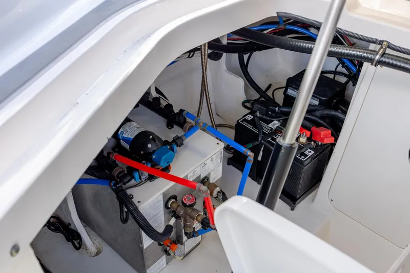 Slide: The Image of 2024 Sea Ray Sundancer 320 Outboard cabin interior with modern seating and storage. - 39