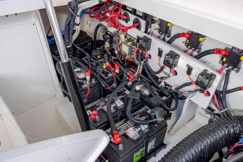 Slide: The Image of 2024 Sea Ray Sundancer 320 Outboard cabin interior with modern design and comfortable seating. - 40