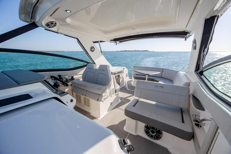 Slide: The Image of 2024 Sea Ray Sundancer 320 Outboard engine compartment showcasing advanced mechanical systems. - 43