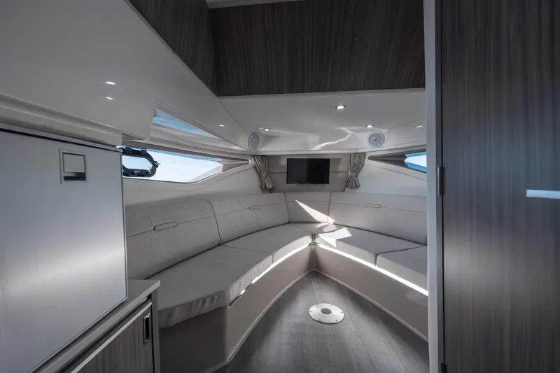 Slide: The Image of 2024 Sea Ray Sundancer 320 Outboard engine compartment with batteries and wiring. - 47