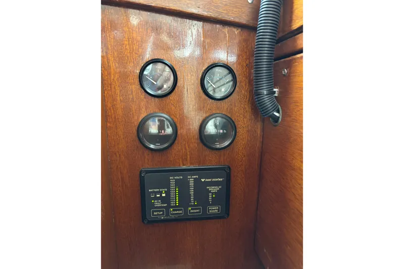 Slide: The Image of 1967 Lyman Islander 30 boat dashboard with gauges and control panel. - 28
