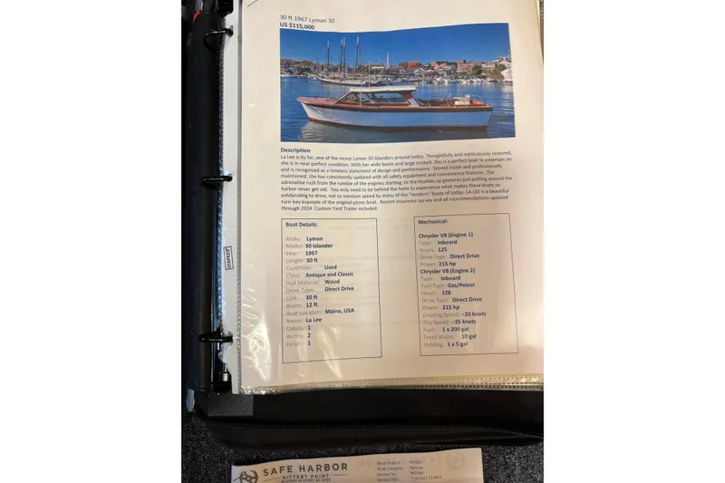 Slide: The Image of 1967 Lyman Islander 30 boat listing with specifications and description in a binder. - 36