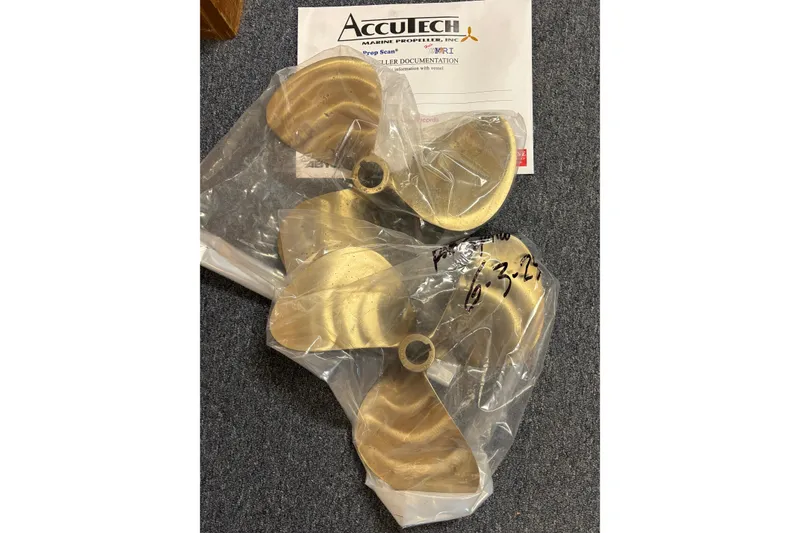 Slide: The Image of New propeller for 1967 Lyman Islander 30, packaged with AccuTech documentation. - 41