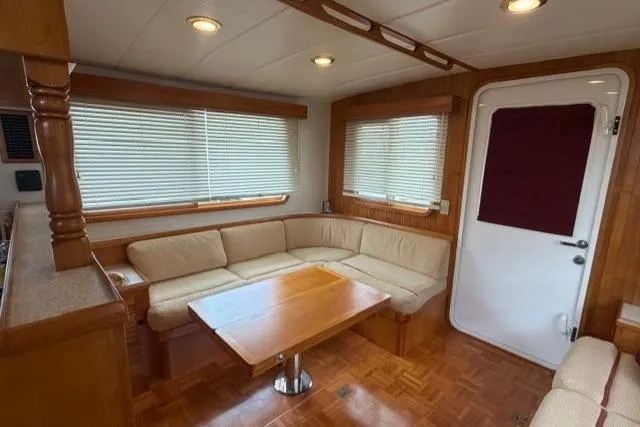 Slide: The Image of Luxurious 2005 Kadey-Krogen 44 yacht interior with cozy seating and elegant wood finishes. - 31