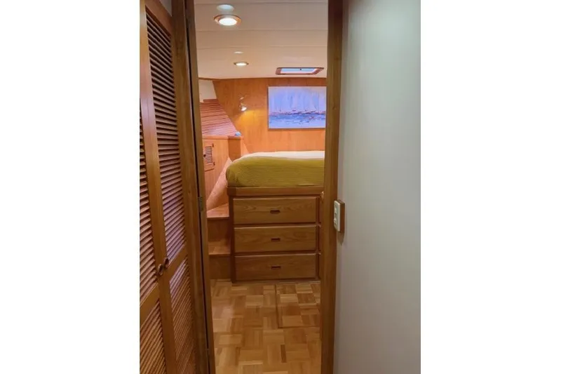 Slide: The Image of Cozy cabin interior of 2005 Kadey-Krogen 44 yacht with wooden furnishings. - 34