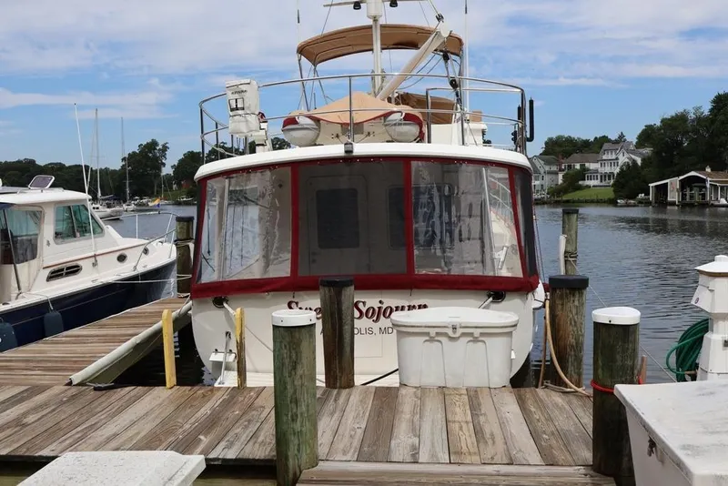 Slide: The Image of Kadey-Krogen 44 yacht docked at marina, 2005 model, rear view. - 5