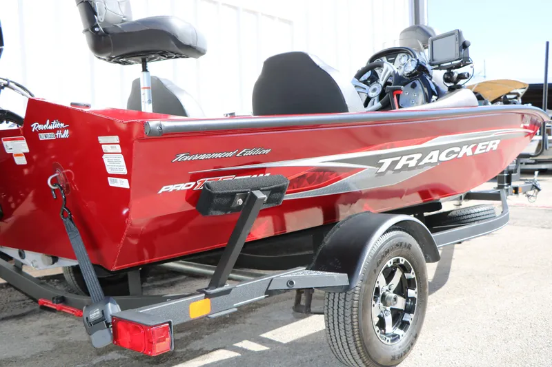 Slide: The Image of 2020 Tracker Pro Team 175 TXW Tournament Edition boat, red, on trailer. - 10