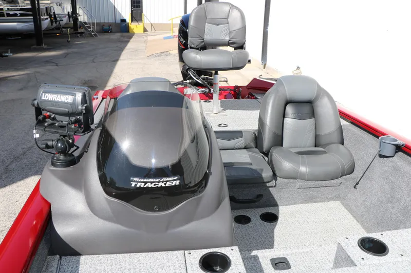 Slide: The Image of 2020 Tracker Pro Team 175 TXW Tournament Edition boat interior with seats and Lowrance fishfinder. - 22