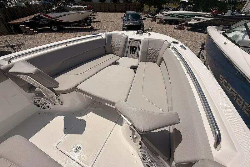 Slide: The Image of 2026 Wellcraft 243 Fisherman boat interior with spacious seating and modern design. - 22