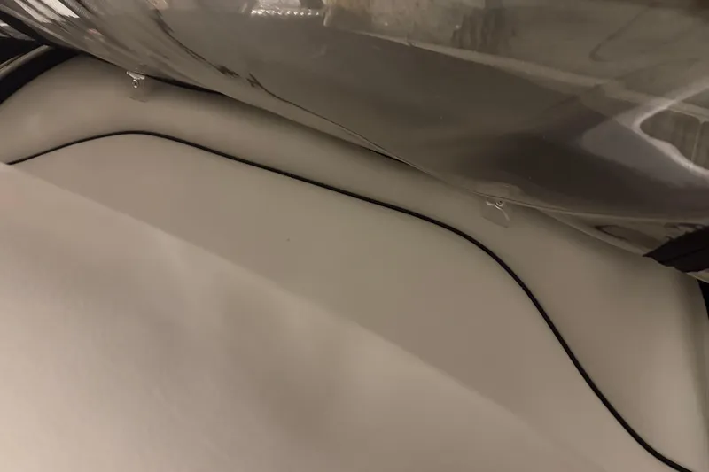 Slide: The Image of 2021 Crownline 264 CR boat interior detail with sleek, modern design elements. - 10