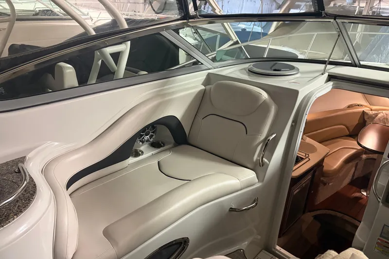 Slide: The Image of 2021 Crownline 264 CR boat interior with luxurious seating and modern design. - 14